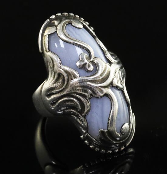 A stylish Georg Jensen sterling silver and banded blue agate oval upfinger ring, no. 18, size L.